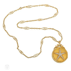 Antique gold and diamond star locket and chain