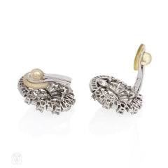 Diamond earrings of circular radiating design