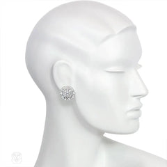 Diamond earrings of circular radiating design