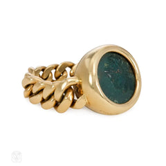 Flexible gold ring set with an ancient Greek coin. Bulgari.