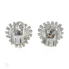 1950s diamond and platinum flower swirl earrings