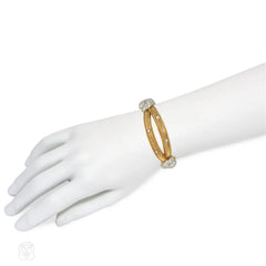 1950s Sterlé gold and diamond x-form bracelet