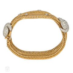 1950s Sterlé gold and diamond x-form bracelet