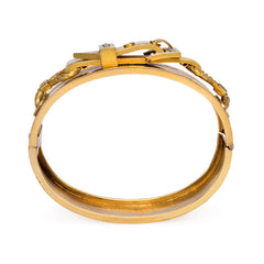 Antique gold, enamel, and pearl buckle bangle