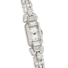 A diamond bracelet watch with geometric links, set with roun...