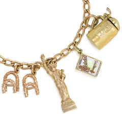 Gold curblink charm bracelet with 12 charms