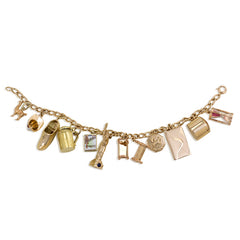 Gold curblink charm bracelet with 12 charms