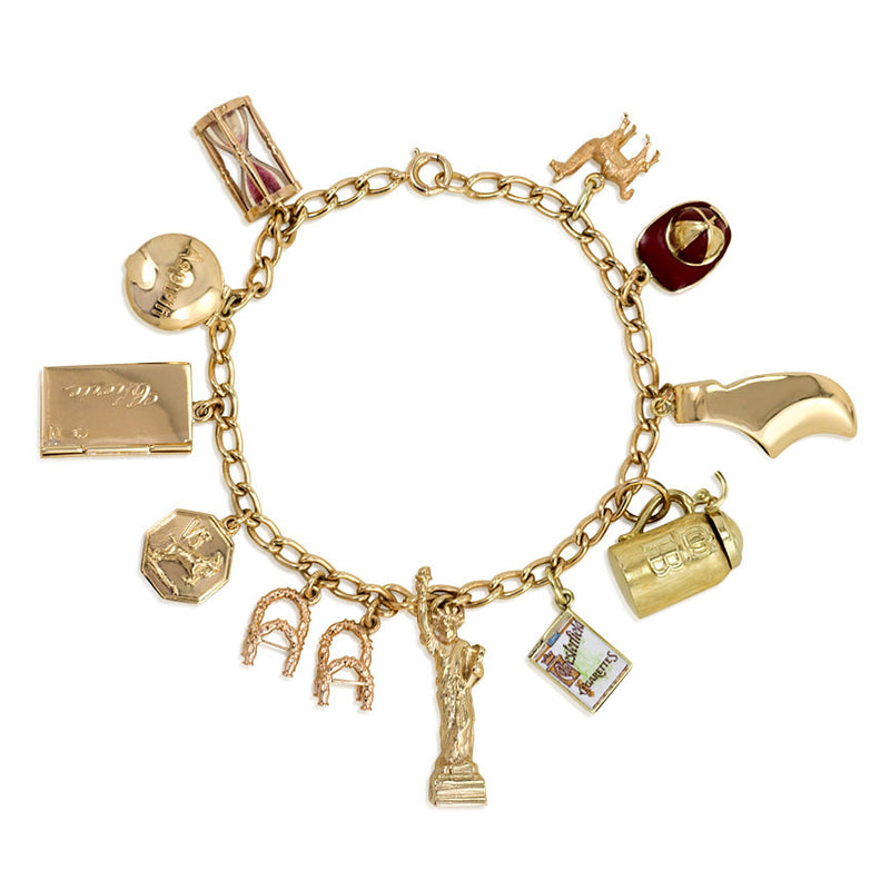 Gold curblink charm bracelet with 12 charms