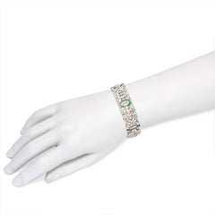 Art Deco diamond bracelet with emerald and onyx accents