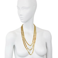 A gold paillete longchain.