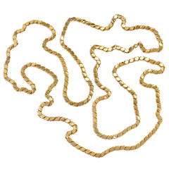 A gold paillete longchain.