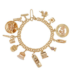 Gold travel theme charm bracelet