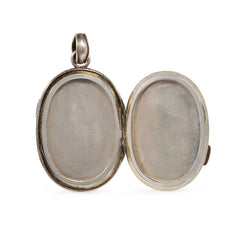 Antique two-sided shakudo locket