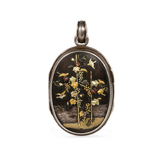 Antique two-sided shakudo locket