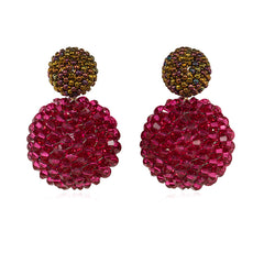 Orange luster and fuchsia hand beaded earrings