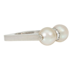Cartier platinum, pearl and diamond spinner ring