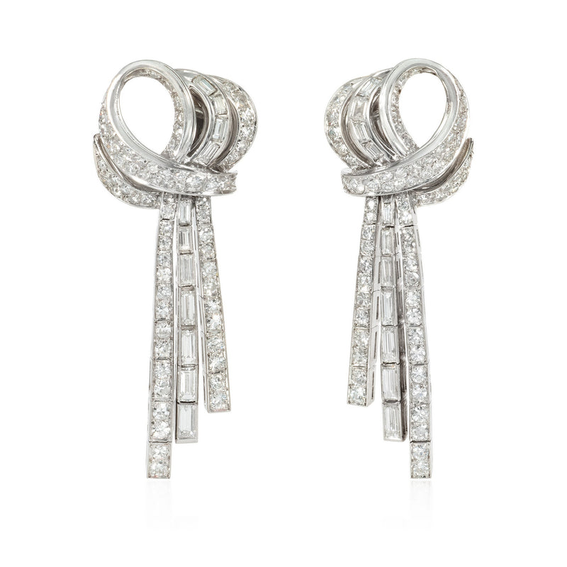 French day-to-night diamond loop and tassel earrings
