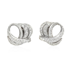 French day-to-night diamond loop and tassel earrings