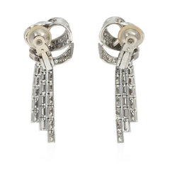 French day-to-night diamond loop and tassel earrings