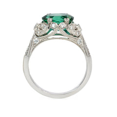 Green zircon solitaire ring with Edwardian style platinum band