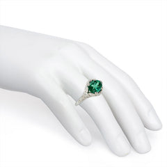 Green zircon solitaire ring with Edwardian style platinum band