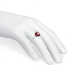 Padparadscha sapphire and platinum ring