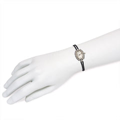 Art Deco diamond and onyx watch with cord band