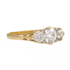 Antique half hoop three-stone diamond ring