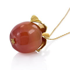 Gold and carnelian apple pendant