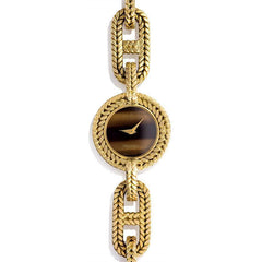 Gold wristwatch with tiger's eye face, L'Enfant for Hermès