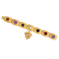 Antique gold and gemset charm bracelet
