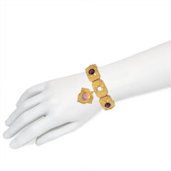 Antique gold and gemset charm bracelet