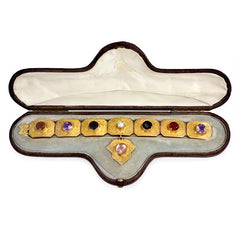 Antique gold and gemset charm bracelet