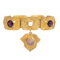 Antique gold and gemset charm bracelet