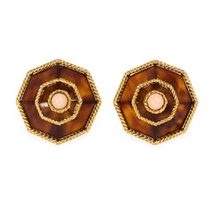 Gold, tortoise shell, and coral earrings, Boucheron.
