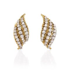 Gold and diamond flame design earrings