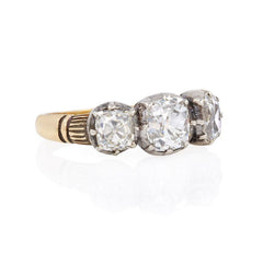 Antique three stone gold and diamond ring