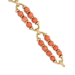 Gold, coral bead, and diamond bracelet