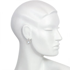 White gold, diamond, and moonstone cluster design earrings