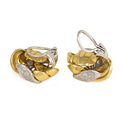 Two-color gold and diamond knot design earrings, Emil Meister