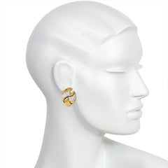 Two-color gold and diamond knot design earrings, Emil Meister
