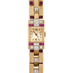 Retro gold, diamond, and ruby watch