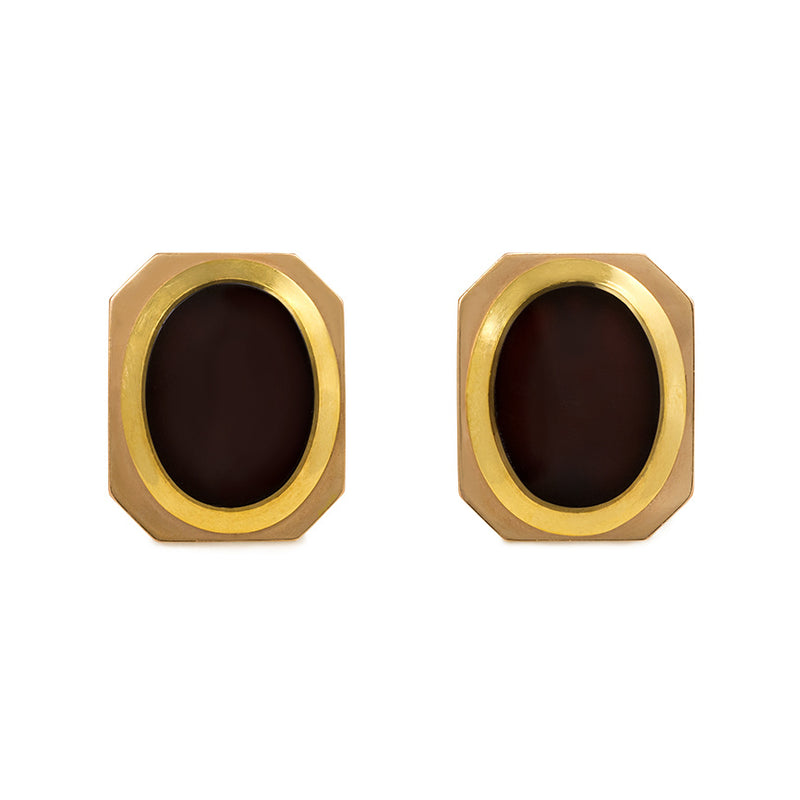 Gold and oval onyx earrings