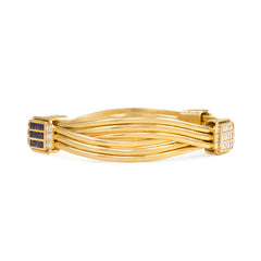 Pair of gold and gemset bangle bracelets