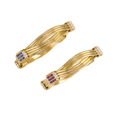 Pair of gold and gemset bangle bracelets