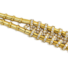 Articulated diamond-wrapped gold bracelet