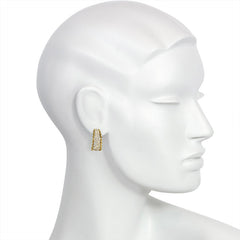 Gold and diamond tapering hoops, Van Cleef & Arpels, NY