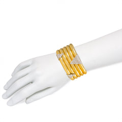 Gold and diamond ribbed cuff, Italy