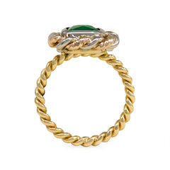 Emerald and mixed metal ring