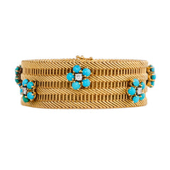 Gold bracelet with turquoise and diamond flower clusters
